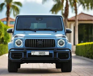 Vista frontale di un noleggio Mercedes-Benz G63 AMG a Dubai, Emirati Arabi Uniti ✓ Auto #13347. ✓ Cambio Automatico TM ✓ 0 recensioni.