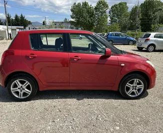Suzuki Swift 2009 disponibile per il noleggio all'aeroporto di Tirana, con limite di chilometraggio di illimitato.