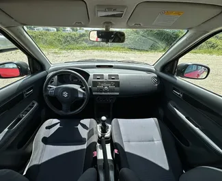Noleggio Suzuki Swift. Auto Economica per il noleggio in Albania ✓ Cauzione di Deposito di 50 EUR ✓ Opzioni assicurative RCT, CDW, SCDW, FDW, Furto, All'estero.
