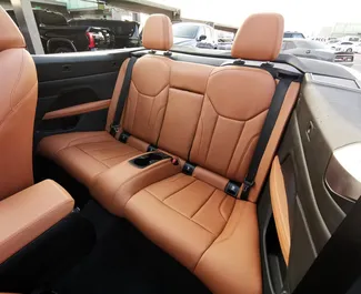Noleggio auto BMW 430i Cabrio 2024 negli Emirati Arabi Uniti, con carburante Benzina e 255 cavalli di potenza ➤ A partire da 549 AED al giorno.
