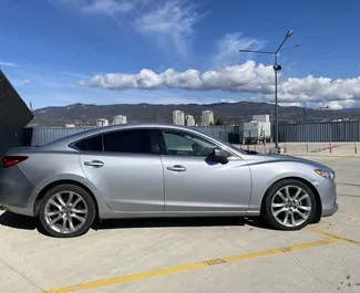 Noleggio Mazda 6. Auto Comfort, Premium per il noleggio in Georgia ✓ Cauzione di Deposito di 100 GEL ✓ Opzioni assicurative RCT, CDW, Passeggeri.