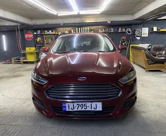Noleggio auto Ford Fusion Sedan 2015 in Georgia, con carburante Benzina e 165 cavalli di potenza ➤ A partire da 105 GEL al giorno.