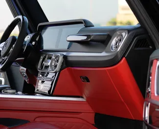 Noleggio Mercedes-Benz G63 AMG. Auto Premium, Lusso, SUV per il noleggio negli Emirati Arabi Uniti ✓ Cauzione di Deposito di 2500 AED ✓ Opzioni assicurative RCT.