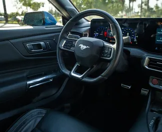 Ford Mustang Cabrio 2024 disponibile per il noleggio a Batumi, con limite di chilometraggio di 200 km/giorno.