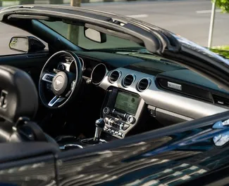 Ford Mustang Cabrio 2019 disponibile per il noleggio a Batumi, con limite di chilometraggio di 200 km/giorno.