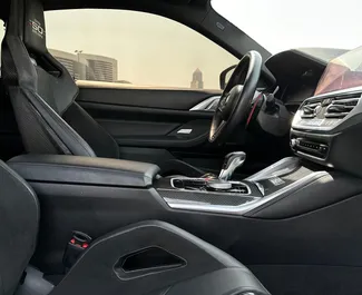 Vista frontale di un noleggio BMW M4 Competition a Dubai, Emirati Arabi Uniti ✓ Auto #13449. ✓ Cambio Automatico TM ✓ 0 recensioni.