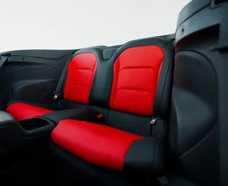 Noleggio Chevrolet Camaro. Auto Premium, Lusso per il noleggio negli Emirati Arabi Uniti ✓ Cauzione di Deposito di 2500 AED ✓ Opzioni assicurative RCT.