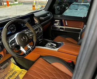 Noleggio auto Mercedes-Benz G63 AMG 2024 negli Emirati Arabi Uniti, con carburante Benzina e 585 cavalli di potenza ➤ A partire da 1600 AED al giorno.