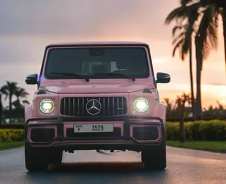 Vista frontale di un noleggio Mercedes-Benz G63 AMG a Dubai, Emirati Arabi Uniti ✓ Auto #13486. ✓ Cambio Automatico TM ✓ 0 recensioni.