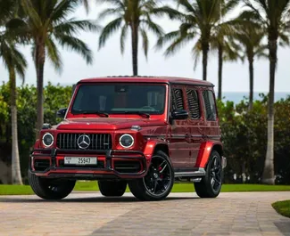 Vista frontale di un noleggio Mercedes-Benz G63 AMG a Dubai, Emirati Arabi Uniti ✓ Auto #13384. ✓ Cambio Automatico TM ✓ 0 recensioni.