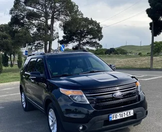 Vista frontale di un noleggio Ford Explorer a Tbilisi, Georgia ✓ Auto #13465. ✓ Cambio Automatico TM ✓ 0 recensioni.