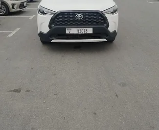Noleggio auto Toyota Corolla Cross 2024 negli Emirati Arabi Uniti, con carburante Benzina e 196 cavalli di potenza ➤ A partire da 67 AED al giorno.