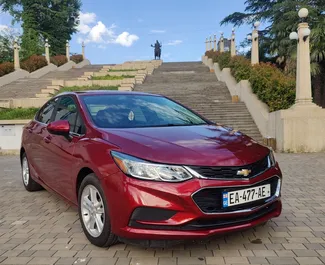 Vista frontale di un noleggio Chevrolet Cruze a Kutaisi, Georgia ✓ Auto #13929. ✓ Cambio Automatico TM ✓ 0 recensioni.