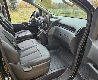 Interni di Hyundai Staria in affitto in Bielorussia. Un'ottima auto da 9 posti con cambio Automatico.