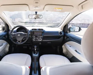 Noleggio Mitsubishi Attrage. Auto Economica per il noleggio in Georgia ✓ Cauzione di Senza deposito ✓ Opzioni assicurative RCT, SCDW, FDW, Passeggeri.