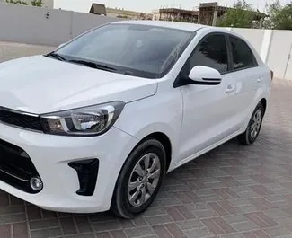 Vista frontale di un noleggio Kia Pegas a Dubai, Emirati Arabi Uniti ✓ Auto #14002. ✓ Cambio Automatico TM ✓ 0 recensioni.