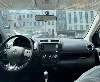 Noleggio Mitsubishi Attrage. Auto Economica per il noleggio in Georgia ✓ Cauzione di Senza deposito ✓ Opzioni assicurative RCT, SCDW, FDW, Passeggeri.
