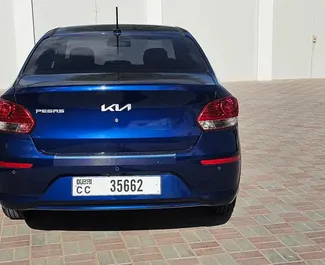 Vista frontale di un noleggio Kia Pegas a Dubai, Emirati Arabi Uniti ✓ Auto #14004. ✓ Cambio Automatico TM ✓ 0 recensioni.