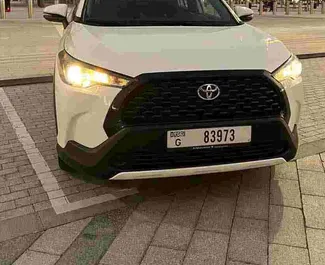Noleggio auto Toyota Corolla Cross 2023 negli Emirati Arabi Uniti, con carburante Benzina e 196 cavalli di potenza ➤ A partire da 67 AED al giorno.