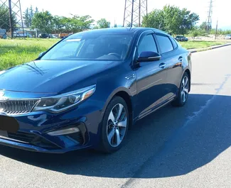 Vista frontale di un noleggio Kia Optima a Kutaisi, Georgia ✓ Auto #14105. ✓ Cambio Automatico TM ✓ 0 recensioni.