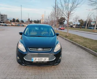 Vista frontale di un noleggio Ford C-Max a Tbilisi, Georgia ✓ Auto #14529. ✓ Cambio Automatico TM ✓ 0 recensioni.