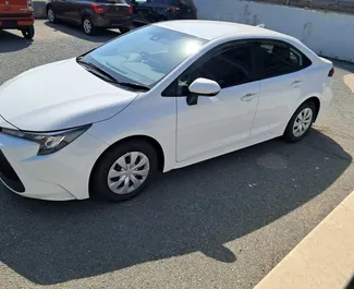 Noleggio auto Toyota Corolla Sedan 2024 a Cipro, con carburante Ibrido e 145 cavalli di potenza ➤ A partire da 35 EUR al giorno.