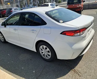 Vista frontale di un noleggio Toyota Corolla Sedan a Limassol, Cipro ✓ Auto #14488. ✓ Cambio Automatico TM ✓ 0 recensioni.