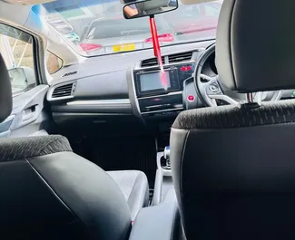 Vista frontale di un noleggio Honda Fit a Mauritius, Mauritius ✓ Auto #14452. ✓ Cambio Automatico TM ✓ 0 recensioni.