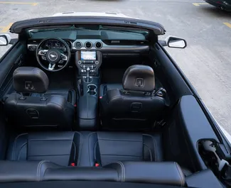 Ford Mustang Cabrio 2019 disponibile per il noleggio a Batumi, con limite di chilometraggio di 200 km/giorno.