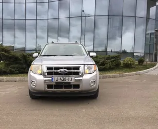 Vista frontale di un noleggio Ford Escape a Tbilisi, Georgia ✓ Auto #14525. ✓ Cambio Automatico TM ✓ 0 recensioni.