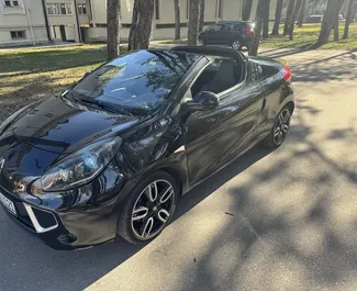 Renault Wind Cabrio 2014 disponibile per il noleggio a Budva, con limite di chilometraggio di illimitato.
