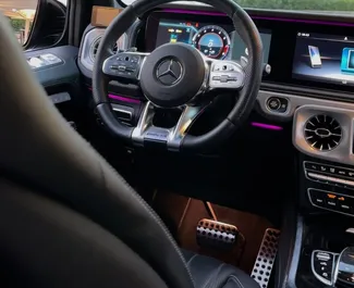 Noleggio auto Mercedes-Benz G63 AMG 2023 negli Emirati Arabi Uniti, con carburante Benzina e 570 cavalli di potenza ➤ A partire da 1200 AED al giorno.