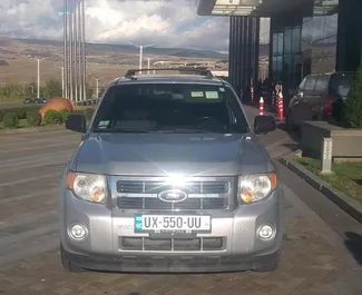 Ford Escape 2012 disponibile per il noleggio a Tbilisi, con limite di chilometraggio di illimitato.