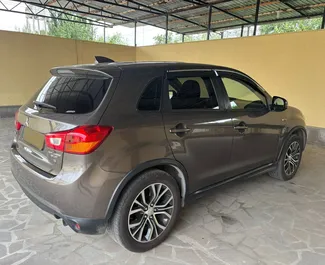 Noleggio Mitsubishi Outlander Sport. Auto Economica, Comfort, SUV, Crossover per il noleggio in Georgia ✓ Cauzione di Deposito di 200 GEL ✓ Opzioni assicurative RCT, CDW, Passeggeri, Furto.