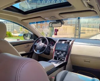 Noleggio Mazda CX-9. Auto Comfort, Premium, Crossover per il noleggio in Azerbaigian ✓ Cauzione di Deposito di 200 AZN ✓ Opzioni assicurative RCT, CDW, Furto.