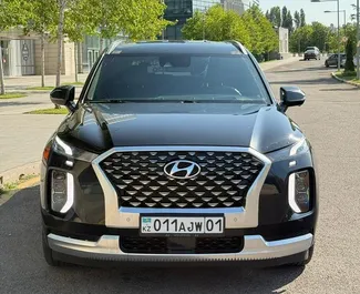 Vista frontale di un noleggio Hyundai Palisade ad Almaty, Kazakistan ✓ Auto #14738. ✓ Cambio Automatico TM ✓ 0 recensioni.