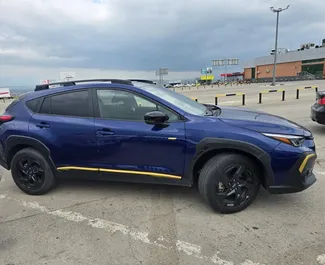 Vista frontale di un noleggio Subaru Crosstrek a Tbilisi, Georgia ✓ Auto #14722. ✓ Cambio Automatico TM ✓ 0 recensioni.