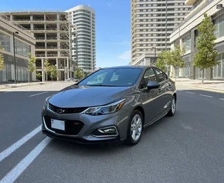Vista frontale di un noleggio Chevrolet Cruze a Baku, Azerbaigian ✓ Auto #14827. ✓ Cambio Automatico TM ✓ 0 recensioni.