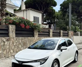 Vista frontale di un noleggio Toyota Corolla a Barcellona, Spagna ✓ Auto #10858. ✓ Cambio Automatico TM ✓ 1 recensioni.