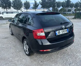 Noleggio Skoda Rapid Spaceback. Auto Economica, Comfort per il noleggio in Albania ✓ Cauzione di Deposito di 100 EUR ✓ Opzioni assicurative RCT, CDW, FDW, All'estero.