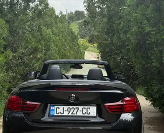 Vista frontale di un noleggio BMW M4 Cabrio a Tbilisi, Georgia ✓ Auto #14830. ✓ Cambio Automatico TM ✓ 0 recensioni.