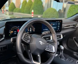 Noleggio auto Ford Mustang Cabrio 2025 in Georgia, con carburante Benzina e 305 cavalli di potenza ➤ A partire da 650 GEL al giorno.