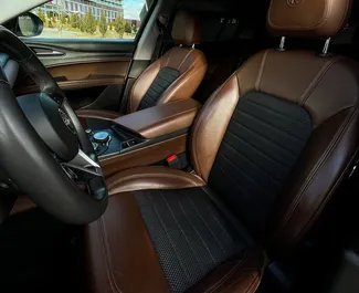 Noleggio Alfa Romeo Stelvio Quadrifoglio. Auto Comfort, SUV, Crossover per il noleggio in Bielorussia ✓ Cauzione di Deposito di 200 USD ✓ Opzioni assicurative RCT, CDW.