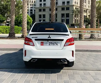 Noleggio Mitsubishi Attrage. Auto Economica per il noleggio negli Emirati Arabi Uniti ✓ Cauzione di Deposito di 1500 AED ✓ Opzioni assicurative RCT, CDW, SCDW, Passeggeri, Furto.
