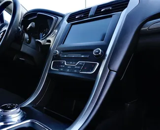 Noleggio Ford Fusion Sedan. Auto Comfort, Premium per il noleggio in Bielorussia ✓ Cauzione di Deposito di 100 USD ✓ Opzioni assicurative RCT, CDW.