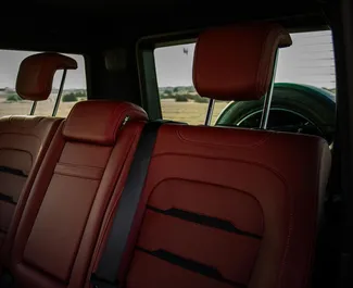 Noleggio Mercedes-Benz G63 AMG. Auto Premium, Lusso, SUV per il noleggio negli Emirati Arabi Uniti ✓ Cauzione di Deposito di 2500 AED ✓ Opzioni assicurative RCT.