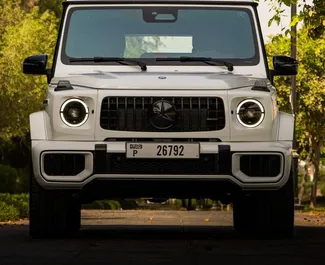 Vista frontale di un noleggio Mercedes-Benz G63 AMG a Dubai, Emirati Arabi Uniti ✓ Auto #6164. ✓ Cambio Automatico TM ✓ 0 recensioni.