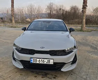 Noleggio auto Kia K5 2021 in Georgia, con carburante Benzina e 180 cavalli di potenza ➤ A partire da 165 GEL al giorno.