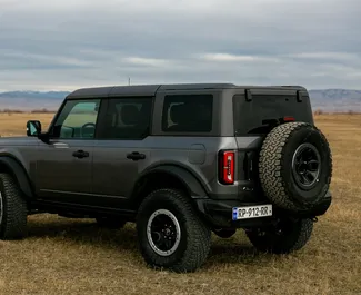 Noleggio auto Ford Bronco 2024 in Georgia, con carburante Benzina e 330 cavalli di potenza ➤ A partire da 380 GEL al giorno.