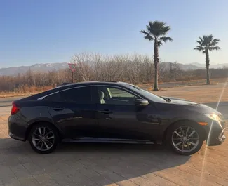 Vista frontale di un noleggio Honda Civic a Batumi, Georgia ✓ Auto #15519. ✓ Cambio Automatico TM ✓ 0 recensioni.